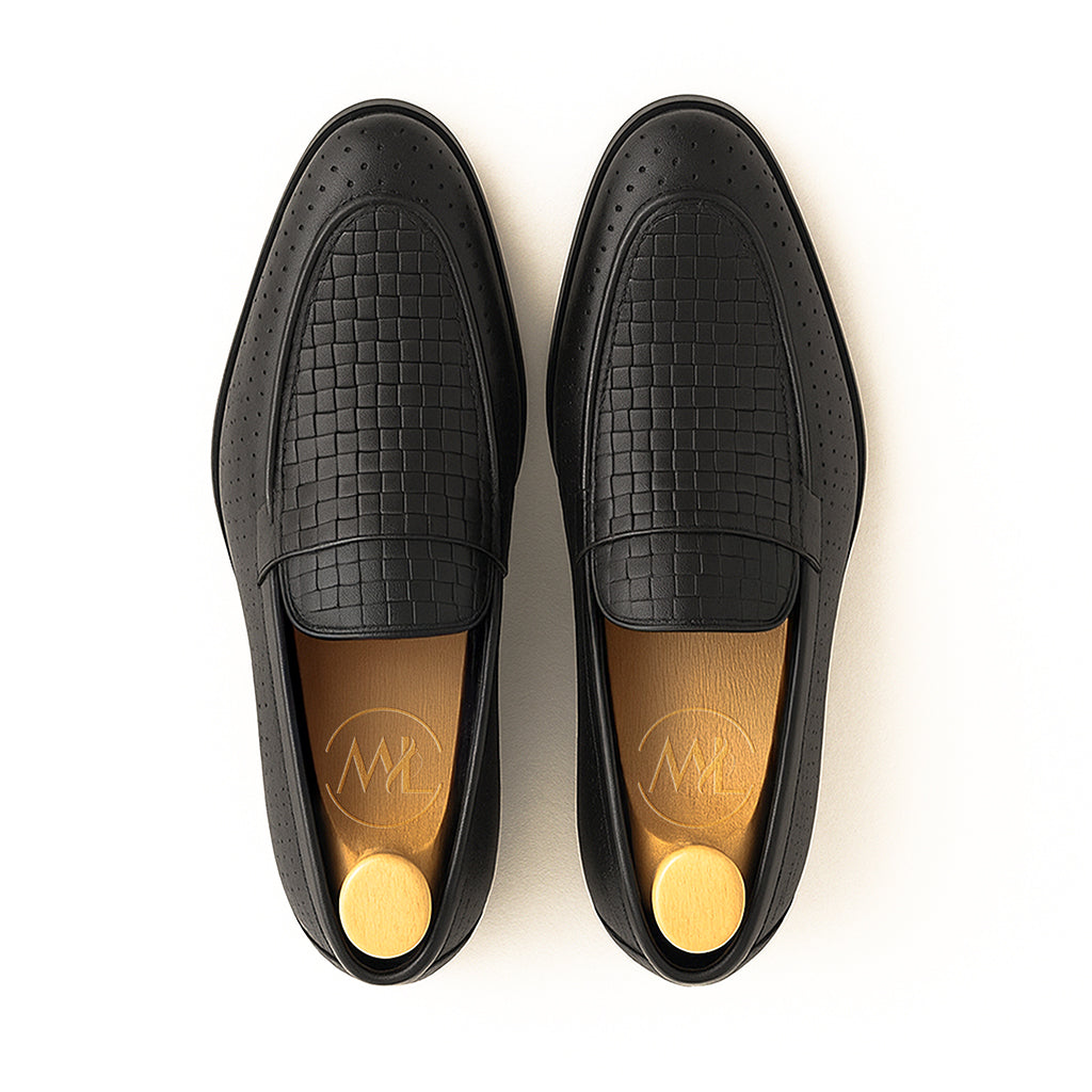 Sole detail of Matteo woven perforated leather loafers, built for durability and all-day comfort.