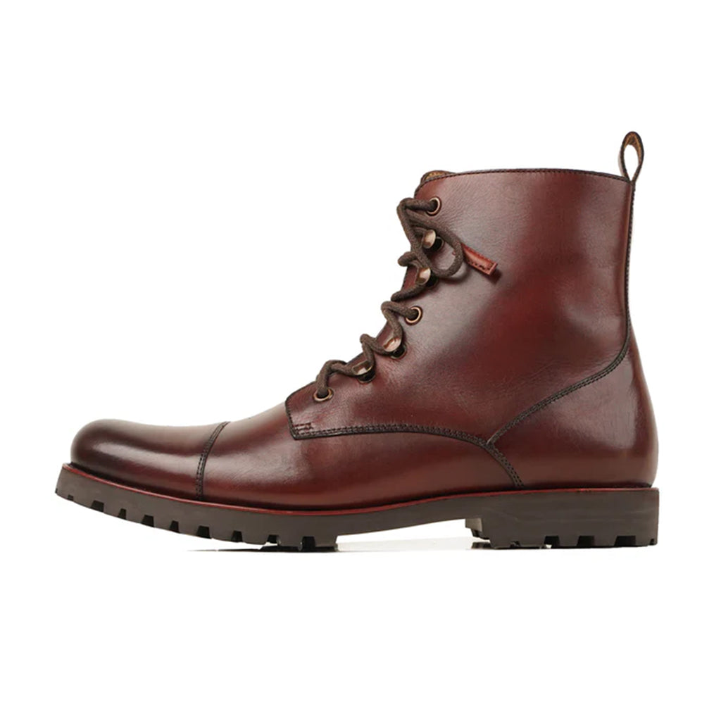 This is Rivaro Heritage Cap Toe Boots Side View. These Luxury Boots are made by artisans with luxury material at Marvel Leather. 