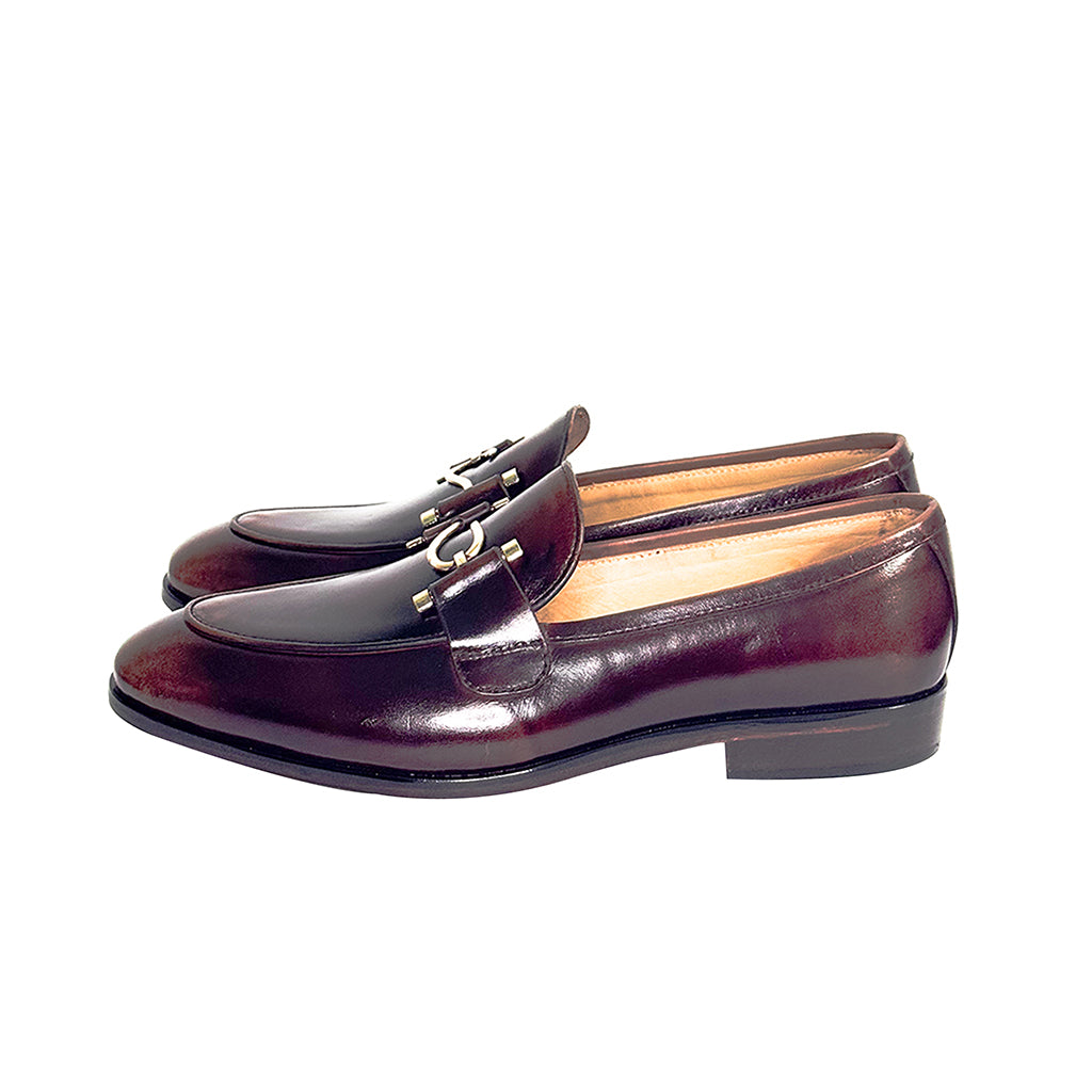 side view of alarico horsebit penny loafers showcasing their refined silhouette and classic style