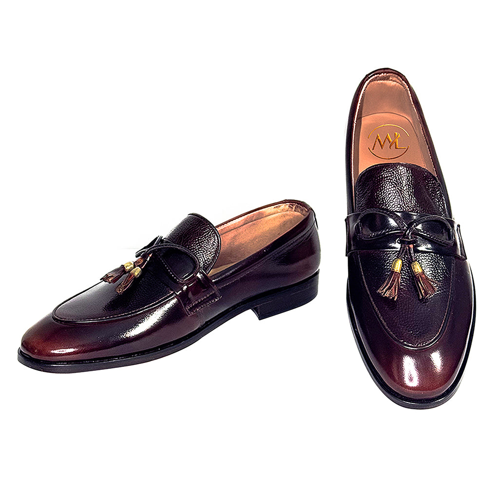 sole detail of giuliano dual finish tassel loafers designed for comfort and durability