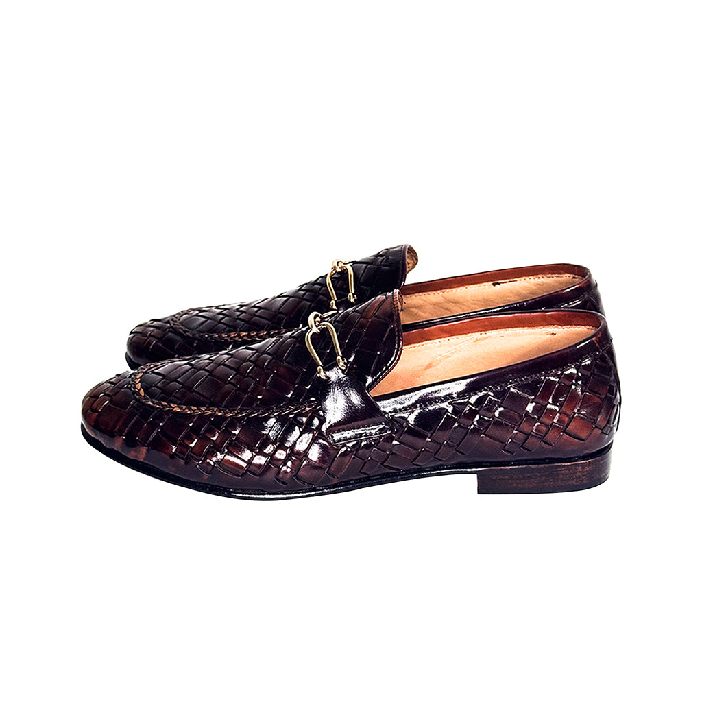 Side profile of Matias handmade brown loafers with woven leather and gold accent